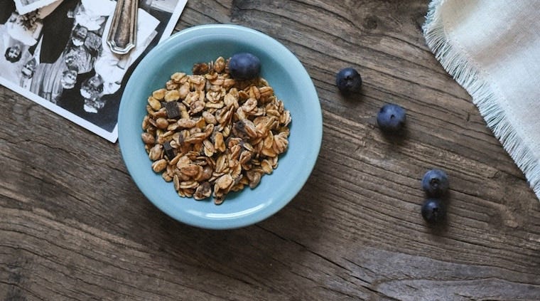 blue bowl of oats with blueberries