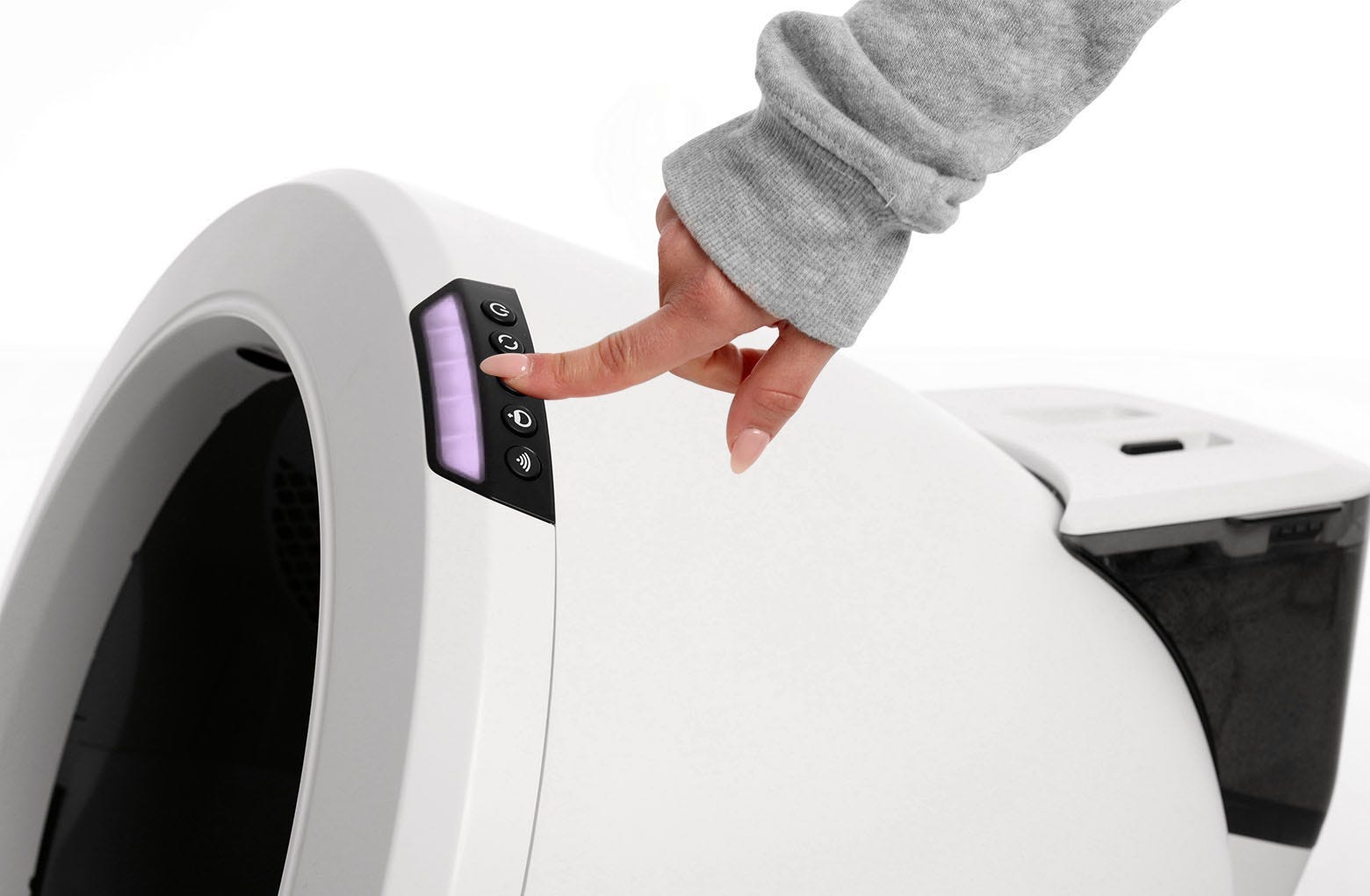 Image of pressing the reset button on the Litter-Robot 4.