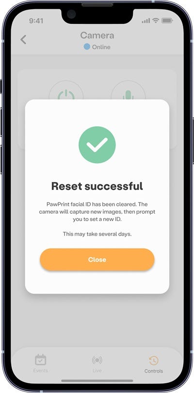 Whisker app screen showing the PawPrint facial ID reset in progress