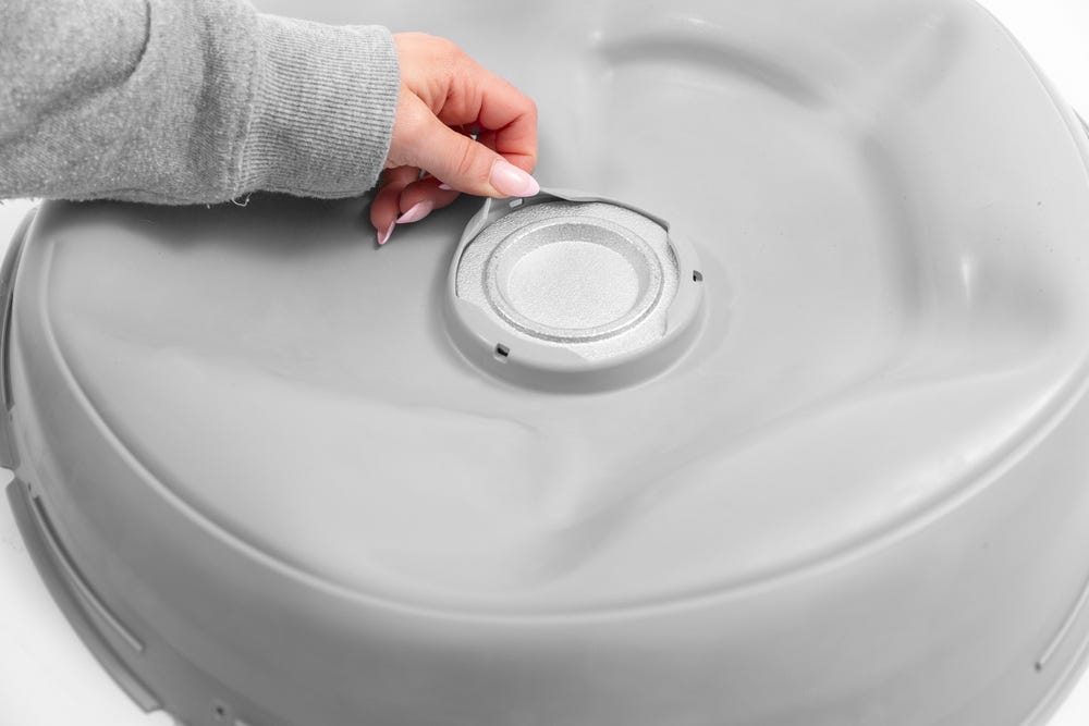 Weight retainer being removed