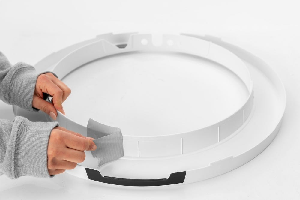 Duct tape adhered to bezel edge