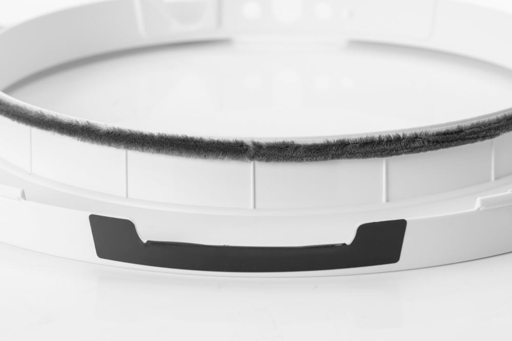 Closeup of seal strip applied on bezel edge