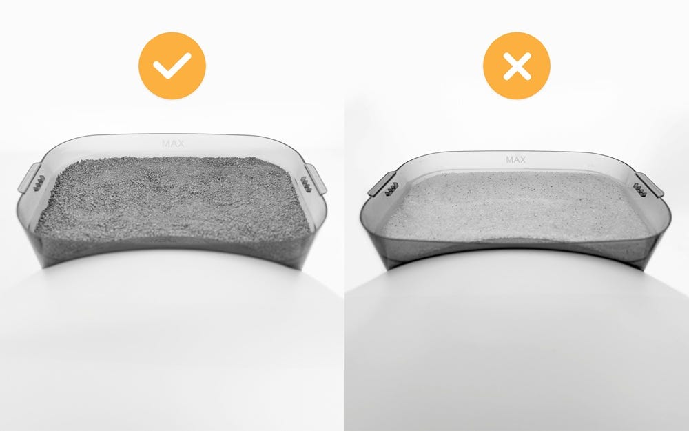 LitterHoppper with lid removed filled with clay litter on one side and filled with crystal litter on the other side