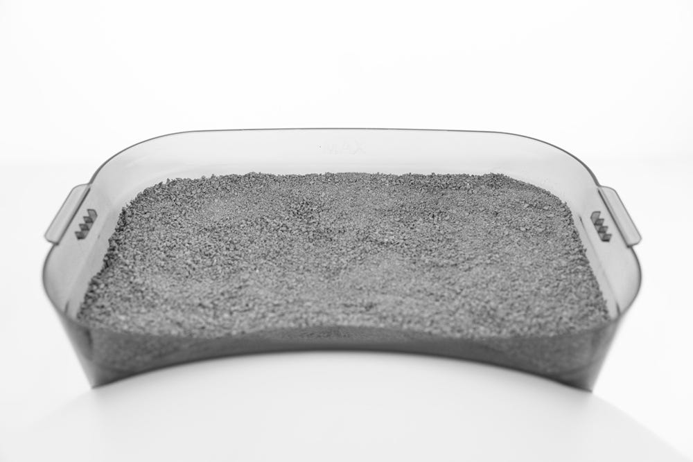 LitterHopper with lid removed and filled with clay litter to MAX fill line