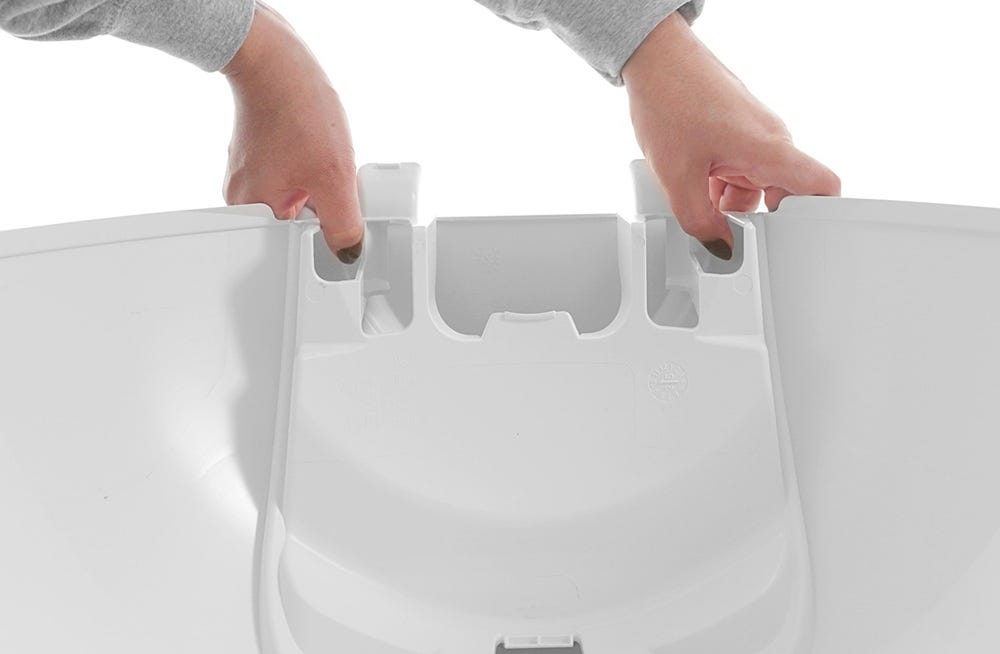 Litter-Robot bonnet plate side clips being pressed outwards