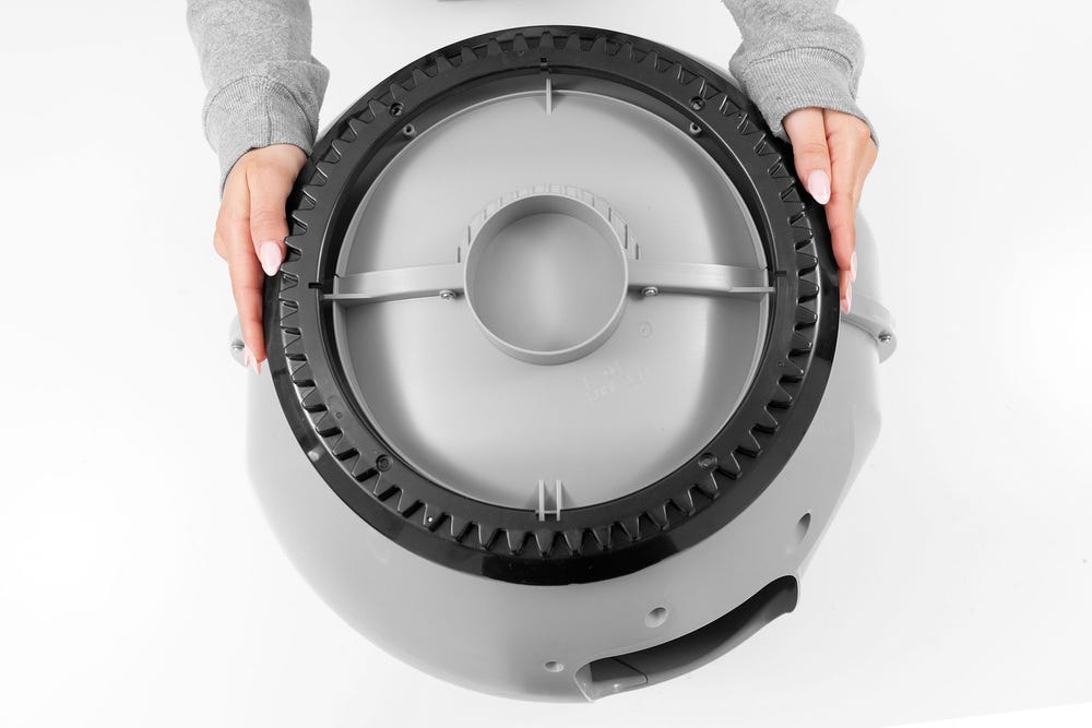 Hands on either side of gear track